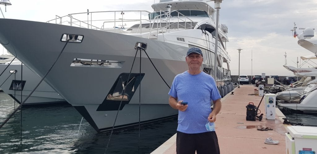 Reynald Vito Grattagliano by his boat